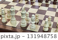 Robot versus human in a strategic chess match showcasing artificial intelligence skills 131948758