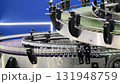 New technology enhances conveyor system efficiency in manufacturing plant 131948759