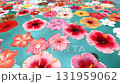 Colorful hibiscus flowers floating on the water - Relaxing video of a tropical resort 131959062