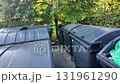 A look inside open rubbish containers. An open container full of waste. The concept of waste management and the environmental impact. Slow motion 131961290