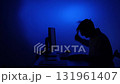 Man in silhouette smashing computer with hammer feeling frustration 131961407