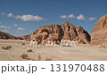 Explore the stunning rock formations and vast landscapes of the Sinai desert in Egypt under a bright blue sky 131970488