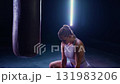 After hard fight, woman pro fighter recovering from a tough workout, deep breathing, woman power, slow motion. 131983206