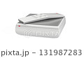 Streaming media player with remote control on white background 131987283