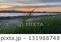 A serene, low-angle shot of an industrial waterfront in Parnu, Estonia 131988748