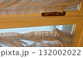 Curtains next to wooden door with brass handle and frosted glass, suitable for interior background video 132002022
