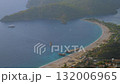 Time lapse: paragliders gliding fast and boats crossing Oludeniz Blue Lagoon 132006965