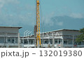 Pile-driving (copra) part of the excavator. Pile driving works at the construction site. Modern hydraulic lifting mechanisms. 132019380