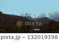 Landscape of greenery rainforest and hills on foggy day. Sky and mist over the mountains. 132019398