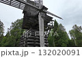 A wooden mill in a Russian village. Slowmotion 132020091