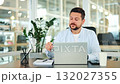 Smiling Businessman in Modern Office Takes Off Glasses 132027355