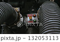 Close-up of fuel tank control panel operation and lamp switching 132053113