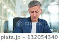 Happy Male Specialist Smiling Confidently in a Modern Office 132054340