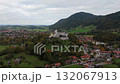 Aerial video of Schloss Hohenaschau in Aschau im Chiemgau, Bavaria, Germany, surrounded by colorful autumn forest and fog over the Priental valley 132067913