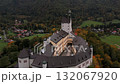 Cloudy autumn drone footage of Hohenaschau Castle, Aschau im Chiemgau, surrounded by mist and forested mountain slopes. Schloss Hohenaschau, Nebel, Kampenwand, Alpenblick, Bayern 132067920