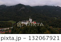 Drone shot, Hohenaschau Castle, Bavaria, cloudy sky. Schloss Hohenaschau, Nebel, Laubenstein, Aschau im Chiemgau. Cloudy drone flight, Hohenaschau Castle. Schloss Hohenaschau, Priental, Kampenwand.  132067921