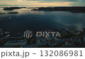 Drone aerial view of a Swedish coastal town at dusk 132086981