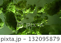 Super Slow Motion Detail Shot of Falling Pile of Fresh Green Hops at 1000 fps. 132095879