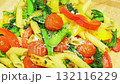 Italian-style dish of stir-fried tomatoes, komatsuna, and pasta 132116229