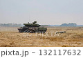 A tank is started at the training ground, ready to go on a combat mission.  132117632