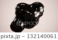 Shiny black liquid substance floating and morphing its shape in zero gravity. Viscous, glossy fluid with bubbles merging and separating on a clean, isolated light background 132140061
