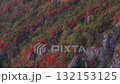 Climbing the cliffs of autumn leaves, the mountaintop hut comes into view, with the Seto Inland Sea and city lights in the background 132153125