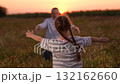 child girl kid childhood outdoors, father man parent male, Father and daughter hug at sunset, Close family bond outdoors, Emotional embrace in nature, Loving father and happy child, Warm sunset in the 132162660