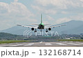 4K Back view on landing airplane 132168714