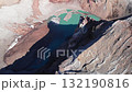Aerial view of a turquoise crater lake. Media 132190816