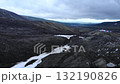 Volcanic mountain valley with melting snow. Media 132190826
