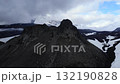 Volcanic mountain peak aerial in snowy icelandic highlands. Media 132190828