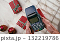 Electronic payment by card the POS for Christmas gift item during Black Friday 132219786