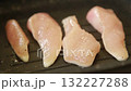 Chicken breast with herbs being fried in a pan 132227288