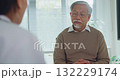 Young Asia female doctor with old man patient use clipboard for consulting, advice and medical expert at desk in health clinic office. Help, appointment support in hospital for diagnosis, physician. 132229174