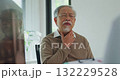 Young Asia female doctor with old man patient use clipboard for consulting, advice and medical expert at desk in health clinic office. Help, appointment support in hospital for diagnosis, physician. 132229528