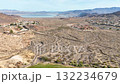 Aerial of Boulder City Nevada Desert and Lake Mead Flyover 132234679