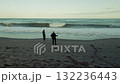 Silhouette Of Two People Admiring The Power Of Nature Stormy Ocean Waves 132236443