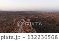 Muslim woman admiring the desert landscape aerial view 132236568