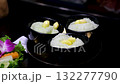 Sticky rice bowls Cooked white rice, iron pot 132277790