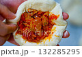 Pyanse, pigodi or Wangmandu steamed pie, dumpling stuffed with kimchi and meat 132285295