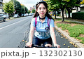 Woman cycling on a bicycle 132302130