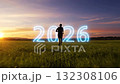 Silhouettes of people running towards 2026 on a grassland at sunrise 132308106