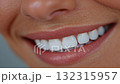 The smile of a girl with beautiful teeth 132315957