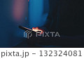 Close up of man hands holding and using smartphone in dark room illuminated by blue light, creating mysterious and technological atmosphere. Digitalization and gadget addiction 132324081