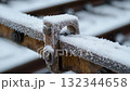 Frost-covered railroad track detail highlights winter conditions in the countryside 132344658