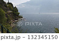 Panoramic spring view of Lake Garda with small ferry at Limone Sul Garda town 132345150