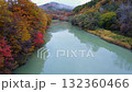 Autumn leaves reflected on the river surface 132360466