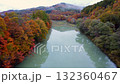 Autumn leaves reflected on the river surface 132360467