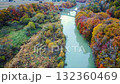 Autumn leaves reflected on the river surface 132360469