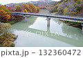 Autumn leaves reflected on the river surface 132360472